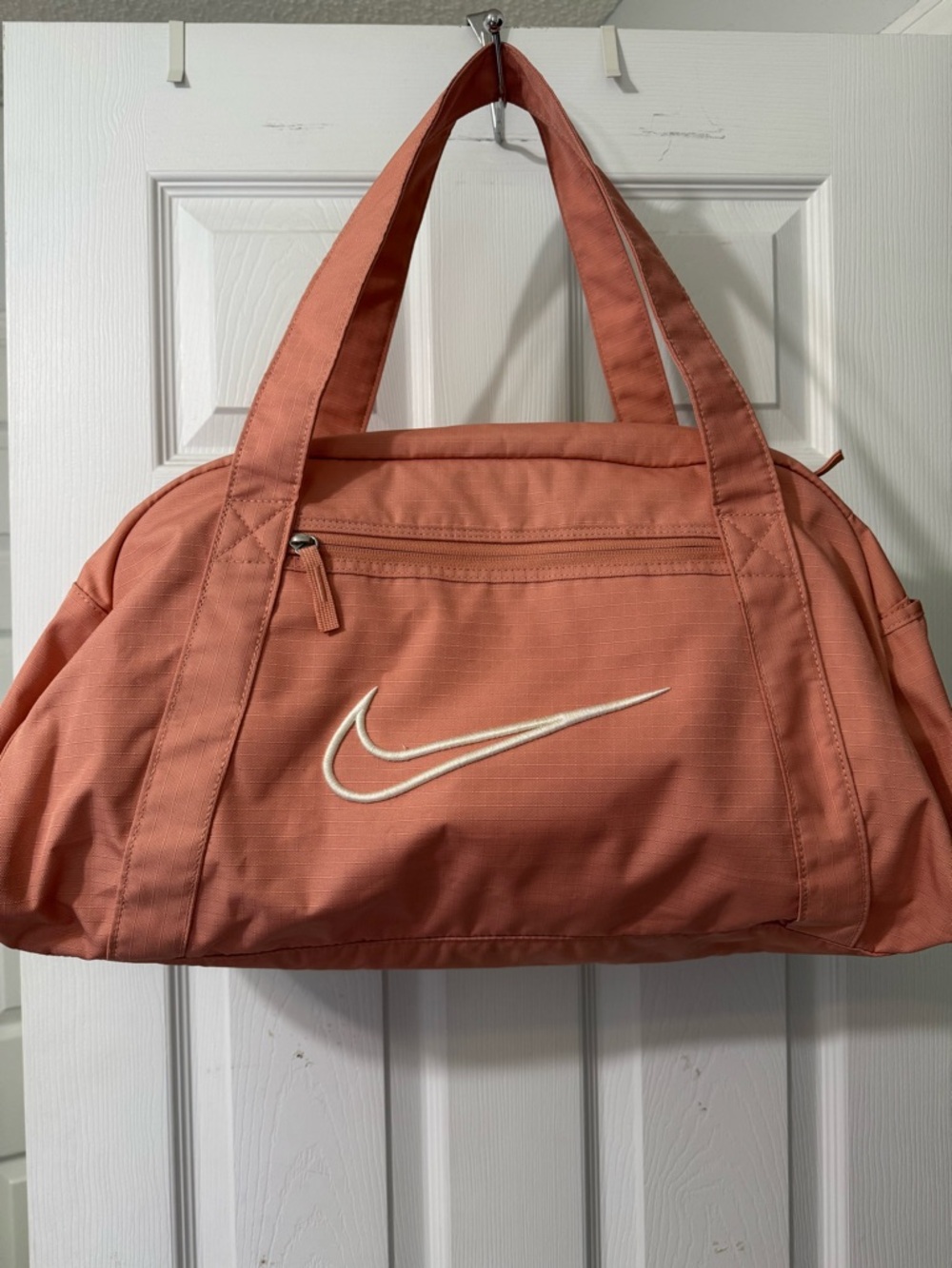 Nike Coral-Orange Duffel Bag with White Swoosh